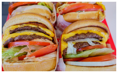 Four double cheeseburgers animal style from In-N-Out