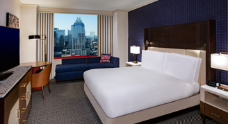 A view of the king bed in the Premium High Floor Room.