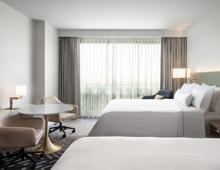 Image of two beds in a Traditional Room.