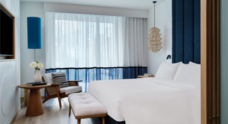 Photo of classic room with king bed.