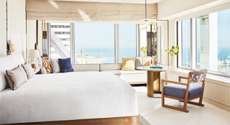 Seascape room with white furniture