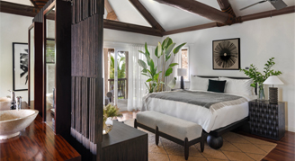 Photo of hotel room with king bed.