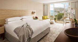 Image of a single bed in an Ocean-View Room.