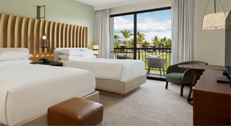 Image of two beds in a Palace Resort-View Room.