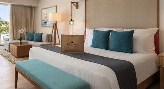Photo of hotel room with a king bed.
