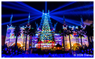 A view of the tree at Walt Disney World at night lit up.