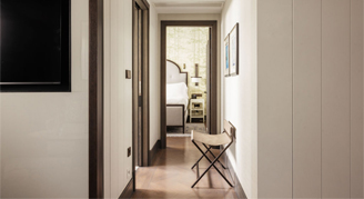 Image of a couch and small table in a One-Bedroom Suite.