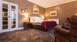 Image of a single bed in a Classic 1785 Room.