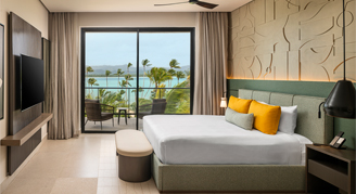 Photo of Beach-View Room with one king bed.