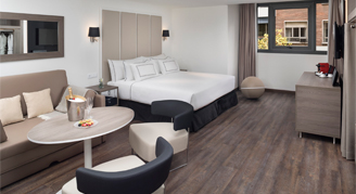 Image of a single bed in a Level Suite.