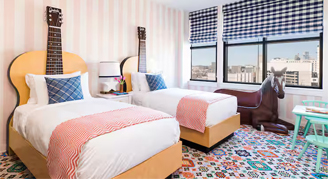 Family Suite featuring guitar themed beds.