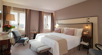 A single bed in a city view room.