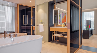 Image of the Andaz-View Suite's bathroom and connecting bedroom.