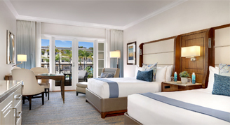 Image of two beds in a Courtyard Room.