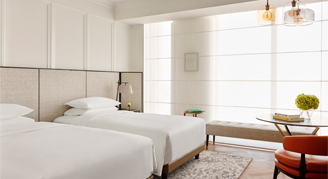 Image of two beds in a Guest Room.