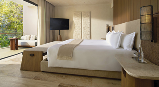 Image of a single bed in a Beach Area Suite.