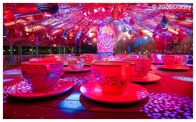 Photo of the Teacup ride at night.