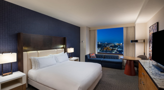 A view of the king bed in the City-View Room.