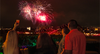 A group looking at the fireworks at Disney California Adventure Park