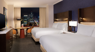 A view of the two queen beds in the Premium High Floor Room.