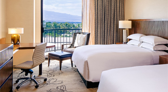 Image of a two beds in a Makai Resort-View Room.