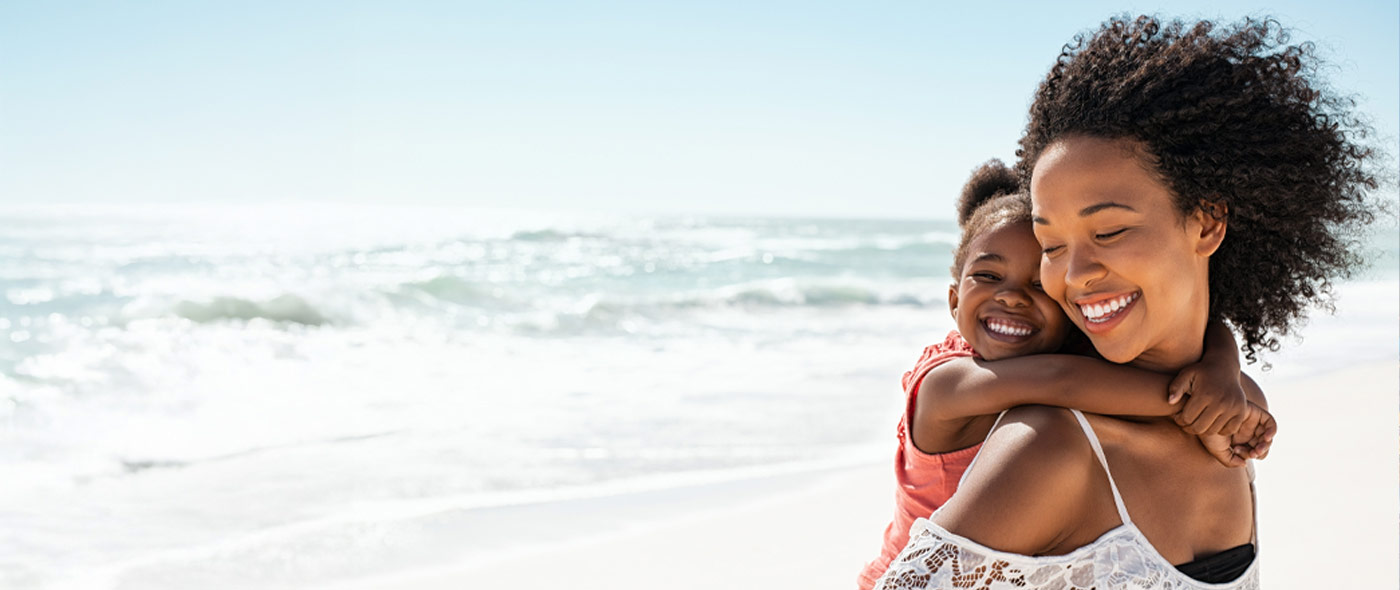 Mother and daughter on the beach