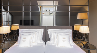 Image of two beds in a Suite.