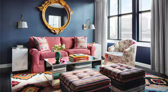 Graduate Suite featuring a sofa and single seat couch.