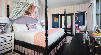 The Graduate Junior Suite featuring a king bed.