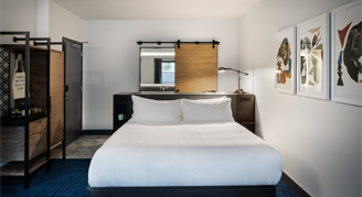 Photo of one king bed.