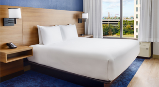 Image of a single bed in a High-Floor Room.