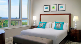 Image of a single bed in the Resort-View Room at Palm Beach Marriott Singer Island Beach Resort & Spa.
