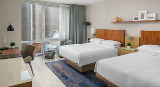 Image of two beds in a High-Floor City-View Oversized Room.