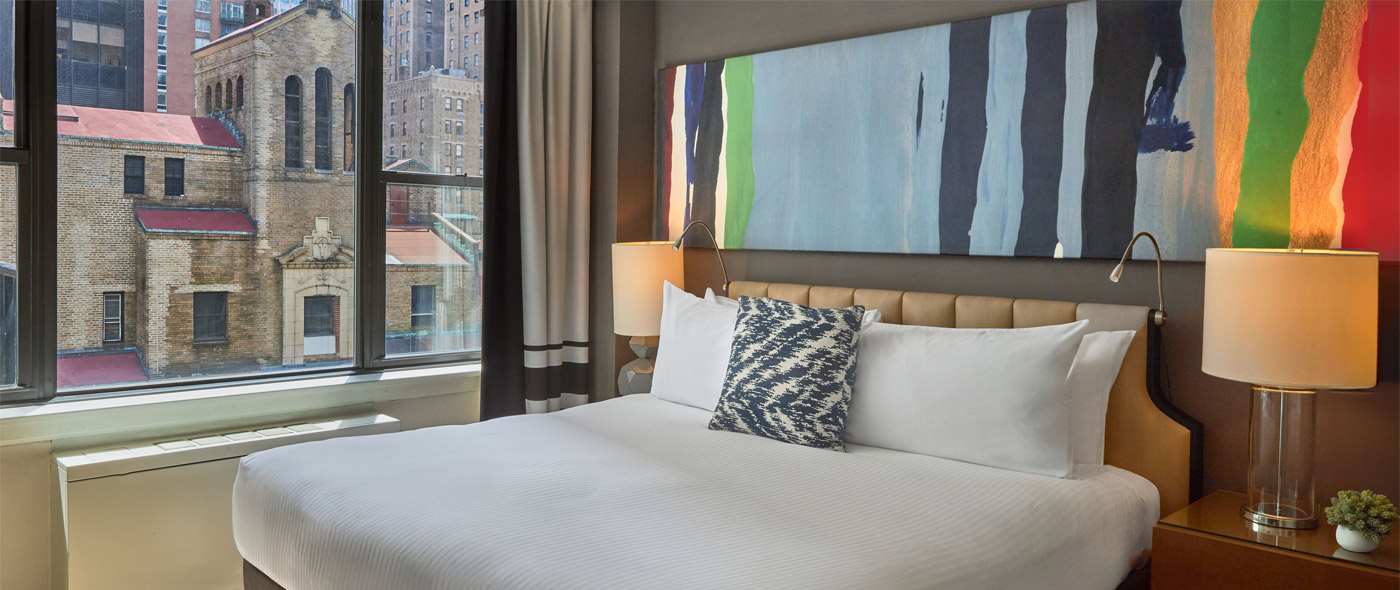 Hotel room with city view at The Fifty Sonesta Hotel New York