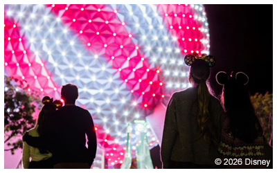 Image of guest looking at Spaceship Earth at EPCOT.