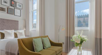 City-view studio spacious bed area.