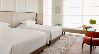 Image of two twin beds in a Family Room.