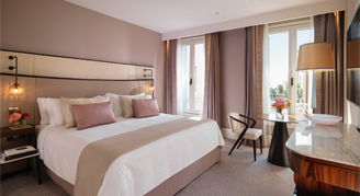 A single bed in a deluxe room.