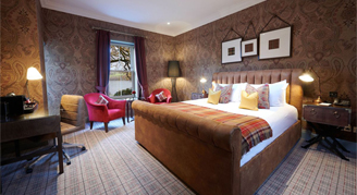 Loch-view room with a double bed