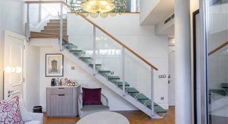Image of a stairwell in a Two-Story Suite.
