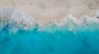 Waves washing on beach on Turks and Caicos