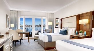 Image of two beds in a Bay-View Room.