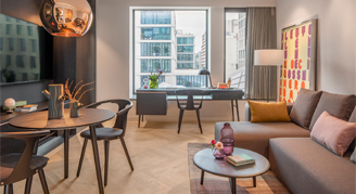 Image of the seating area and window of the Andaz Suite.