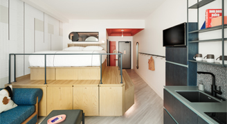 Interior view of the Junior Suite featuring an elevated king bed.