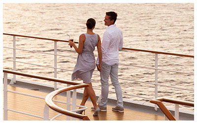 Image of a couple on deck of cruise ship.