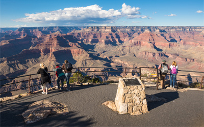 Visitors overlooking the Grand Canyon